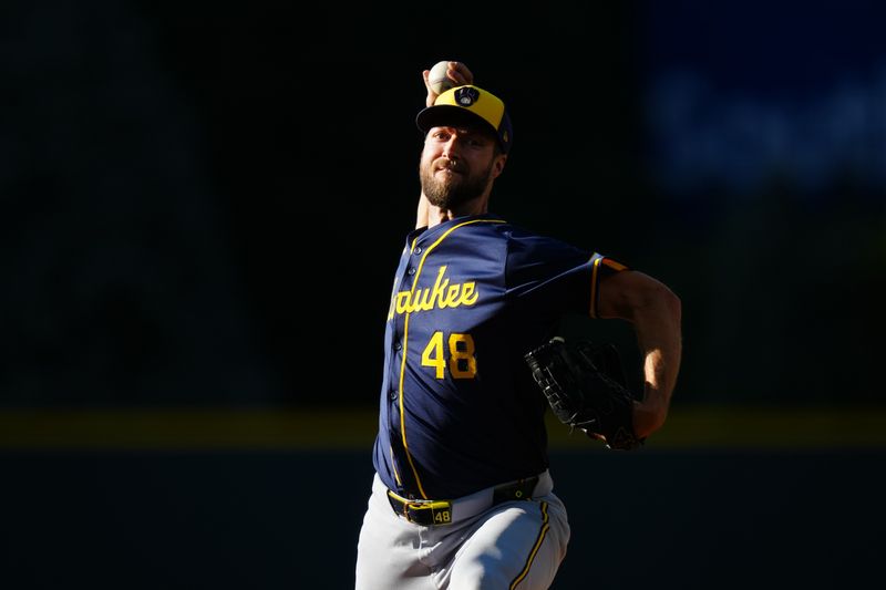 Jul 3, 2024; Denver, Colorado, USA; Milwaukee Brewers starting pitcher Colin Rea (48) delivers a pitch in the first inning against the Colorado Rockies at Coors Field. Mandatory Credit: Ron Chenoy-USA TODAY Sports