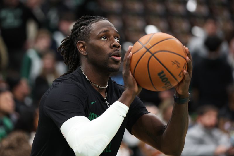 BOSTON, MASSACHUSETTS - FEBRUARY 04: Jrue Holiday #4 of the Boston Celtics warms up before playing a game against the Memphis Grizzlies at TD Garden on February 04, 2024 in Boston, Massachusetts. NOTE TO USER: User expressly acknowledges and agrees that, by downloading and or using this photograph, User is consenting to the terms and conditions of the Getty Images License Agreement. (Photo by Paul Rutherford/Getty Images)