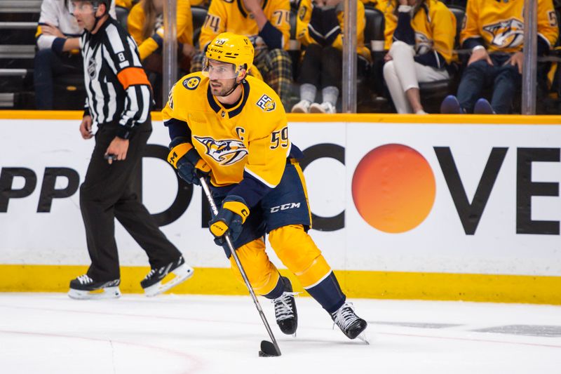 Apr 26, 2024; Nashville, Tennessee, USA; Nashville Predators defenseman Roman Josi (59) skates against the Vancouver Canucks during the second period in game three of the first round of the 2024 Stanley Cup Playoffs at Bridgestone Arena. Mandatory Credit: Steve Roberts-USA TODAY Sports