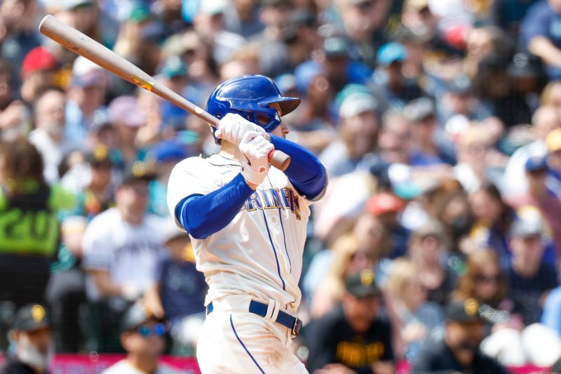 May 28, 2023; Seattle, Washington, USA; Seattle Mariners left fielder Jarred Kelenic (10) hits an RBI-double against the Pittsburgh Pirates during the fifth inning at T-Mobile Park. Mandatory Credit: Joe Nicholson-USA TODAY Sports