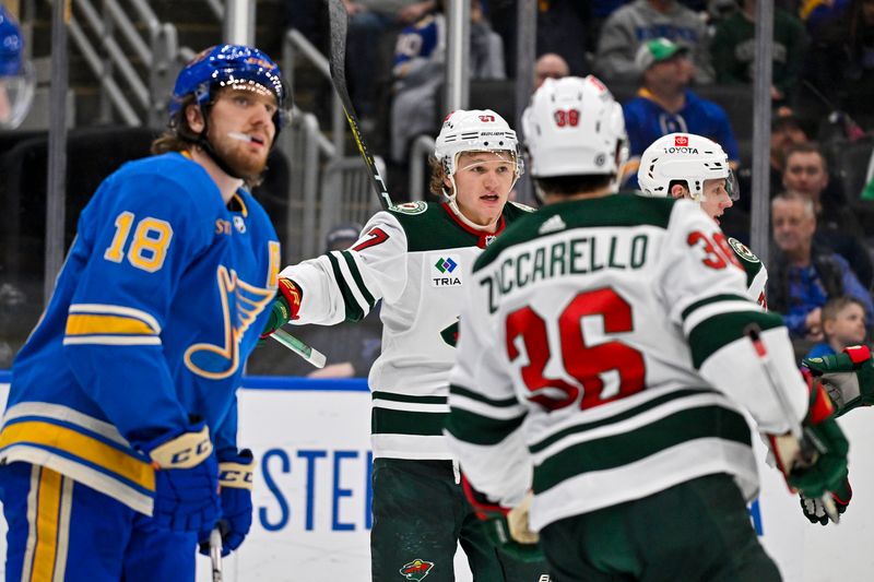 Mar 16, 2024; St. Louis, Missouri, USA;  Minnesota Wild left wing Kirill Kaprizov (97) reacts after scoring the game tying goal against St. Louis Blues goaltender Jordan Binnington (50) during the third period at Enterprise Center. Mandatory Credit: Jeff Curry-USA TODAY Sports