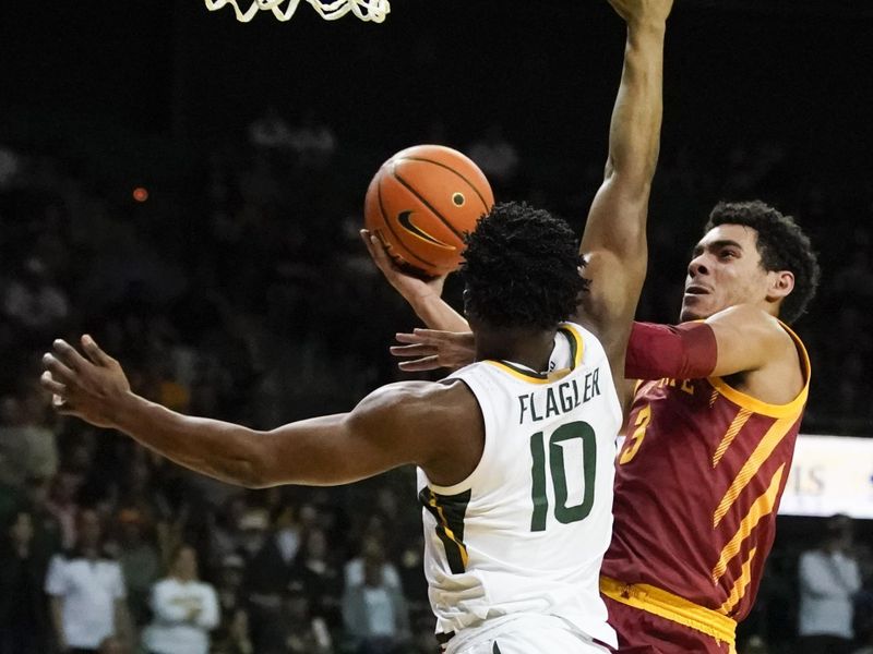 Mar 4, 2023; Waco, Texas, USA; Iowa State Cyclones guard Tamin Lipsey (3) drives to the basket on Baylor Bears guard Adam Flagler (10) during the first half at Ferrell Center. Mandatory Credit: Raymond Carlin III-USA TODAY Sports