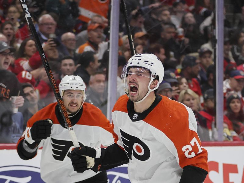 Feb 6, 2024; Sunrise, Florida, USA; Philadelphia Flyers left wing Noah Cates (27) celebrates after scoring against the Florida Panthers during the third period at Amerant Bank Arena. Mandatory Credit: Sam Navarro-USA TODAY Sports