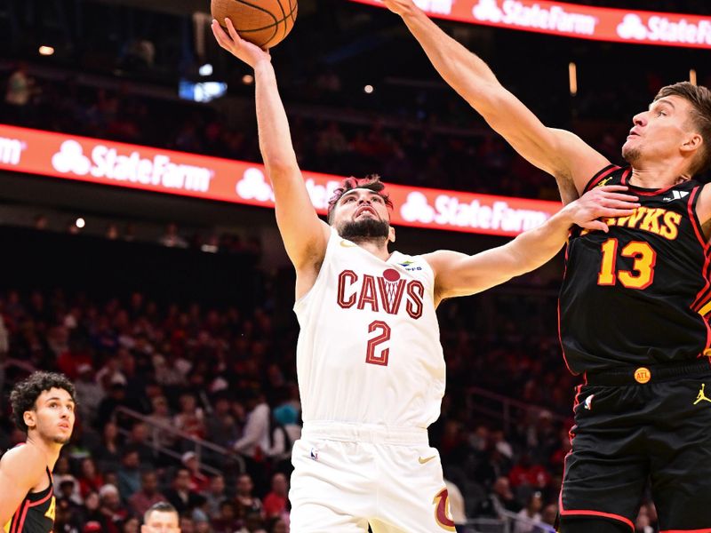 ATLANTA, GA - NOVEMBER 29: Ty Jerome #2 of the Cleveland Cavaliers drives to the basket during the game against the Atlanta Hawks on November 29, 2024 at State Farm Arena in Atlanta, Georgia.  NOTE TO USER: User expressly acknowledges and agrees that, by downloading and/or using this Photograph, user is consenting to the terms and conditions of the Getty Images License Agreement. Mandatory Copyright Notice: Copyright 2024 NBAE (Photo by Adam Hagy/NBAE via Getty Images)