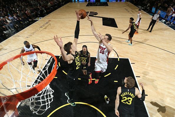 SALT LAKE CITY, UT - DECEMBER 30: Walker Kessler #24 of the Utah Jazz and Duncan Robinson #55 of the Miami Heat go up for a rebound during the game on December 30, 2023 at Delta Center in Salt Lake City, Utah. NOTE TO USER: User expressly acknowledges and agrees that, by downloading and or using this Photograph, User is consenting to the terms and conditions of the Getty Images License Agreement. Mandatory Copyright Notice: Copyright 2023 NBAE (Photo by Melissa Majchrzak/NBAE via Getty Images)