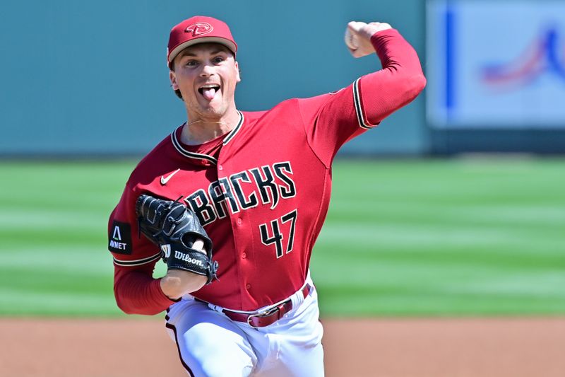 Mar 8, 2023; Salt River Pima-Maricopa, Arizona, USA; Arizona Diamondbacks starting pitcher Tommy Henry (47) throws in the first inning against the Texas Rangers during a Spring Training game at Salt River Fields at Talking Stick. Mandatory Credit: Matt Kartozian-USA TODAY Sports