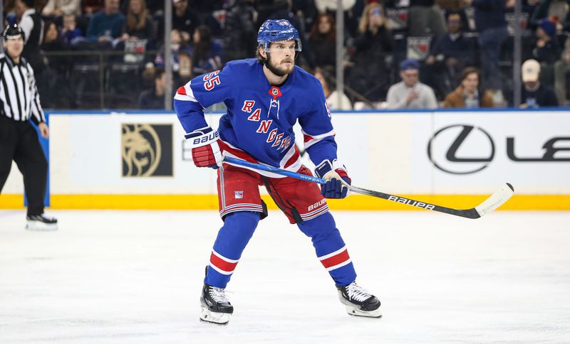 Jan 18, 2025; New York, New York, USA; New York Rangers defenseman Ryan Lindgren (55) skates against the Columbus Blue Jackets during the first period at Madison Square Garden. Mandatory Credit: Danny Wild-Imagn Images