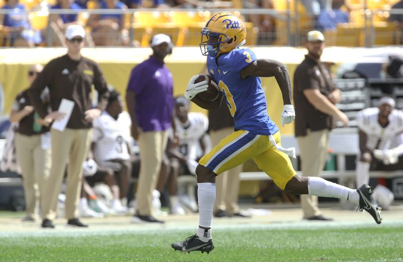 Sep 18, 2021; Pittsburgh, Pennsylvania, USA;  Pittsburgh Panthers wide receiver Jordan Addison (3) runs to score on a sixty-seven yard touchdown catch against the Western Michigan Broncos during the first quarter at Heinz Field. Mandatory Credit: Charles LeClaire-USA TODAY Sports