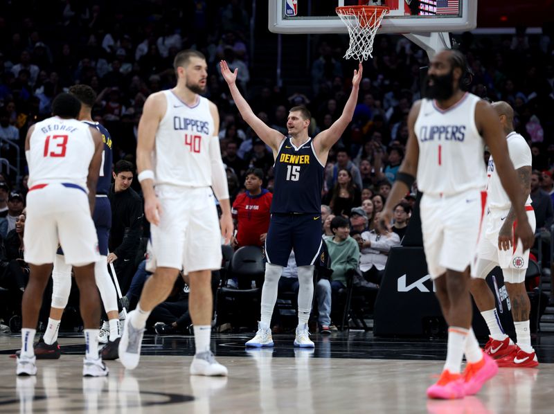 LOS ANGELES, CALIFORNIA - APRIL 04: Nikola Jokic #15 of the Denver Nuggets reacts to a Nuggets foul during a 102-100 against the LA Clippers win at Crypto.com Arena on April 04, 2024 in Los Angeles, California. User is consenting to the terms and conditions of the Getty Images License Agreement. (Photo by Harry How/Getty Images)