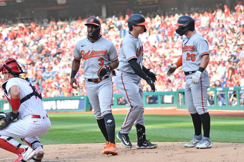 Jul 26, 2023; Philadelphia, Pennsylvania, USA; Baltimore Orioles catcher Adley Rutschman (35) celebrates his three run home run with shortstop Jorge Mateo (3) and outfielder Ryan McKenna (26) during the third inning against the Philadelphia Phillies at Citizens Bank Park. Mandatory Credit: Eric Hartline-USA TODAY Sports