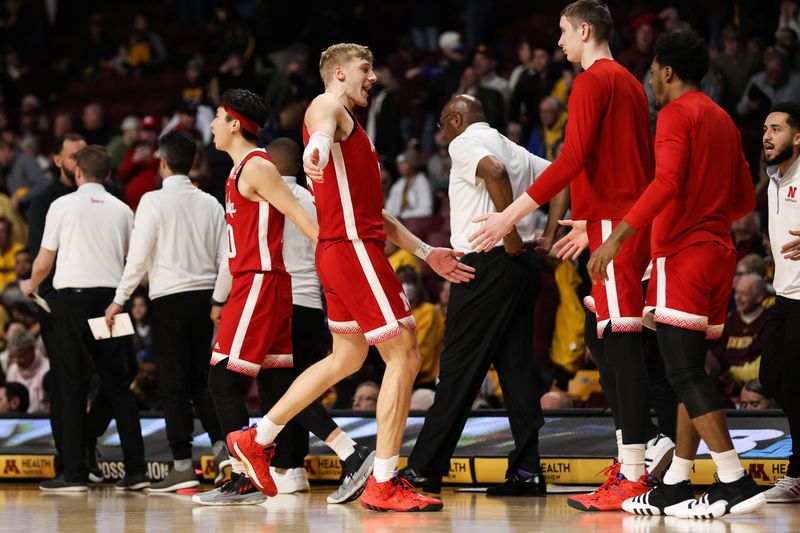 Jan 7, 2023; Minneapolis, Minnesota, USA; Nebraska Cornhuskers guard Sam Griesel (5) celebrates the win against the Minnesota Golden Gophers with teammates after the game at Williams Arena. Mandatory Credit: Matt Krohn-USA TODAY Sports