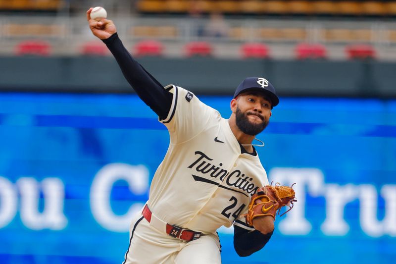Jun 26, 2025; Minneapolis, Minnesota, USA; Minnesota Twins starting pitcher Simeon Woods Richardson (24) throws to the Seattle Mariners in the first inning at Target Field. Mandatory Credit: Bruce Kluckhohn-Imagn Images