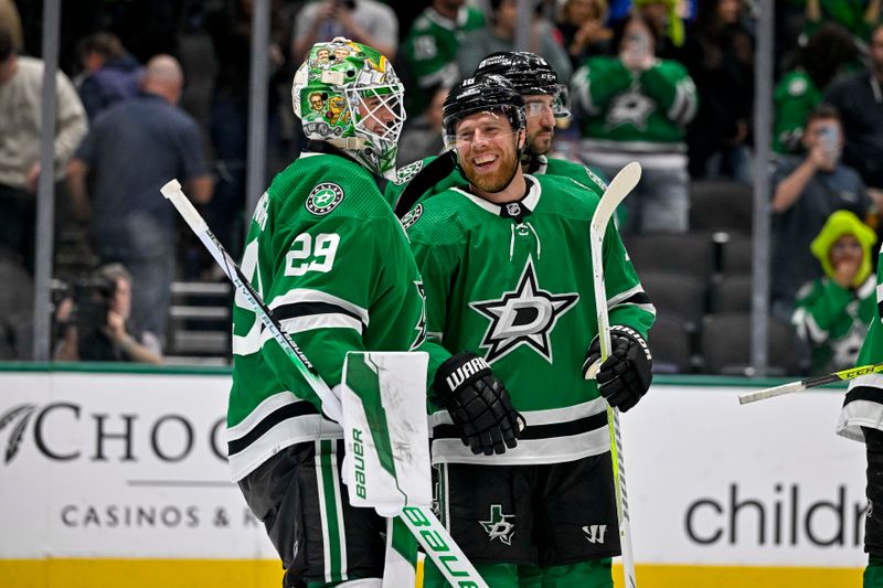 Apr 9, 2024; Dallas, Texas, USA; Dallas Stars goaltender Jake Oettinger (29) and center Joe Pavelski (16) celebrate on the ice after the Stars defeat the Buffalo Sabres at the American Airlines Center. Mandatory Credit: Jerome Miron-USA TODAY Sports