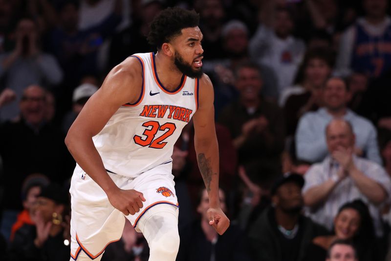 NEW YORK, NEW YORK - NOVEMBER 13: Karl-Anthony Towns #32 of the New York Knicks celebrates after his dunk against the Chicago Bulls during the third quarter at Madison Square Garden on November 13, 2024 in New York City. NOTE TO USER: User expressly acknowledges and agrees that, by downloading and or using this photograph, User is consenting to the terms and conditions of the Getty Images License Agreement. (Photo by Elsa/Getty Images)