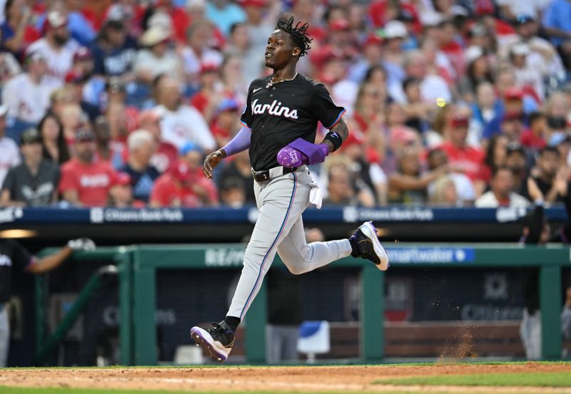 Jun 27, 2024; Philadelphia, Pennsylvania, USA; Miami Marlins outfielder Jazz Chisholm Jr (2) advances home to score against the Philadelphia Phillies in the seventh inning at Citizens Bank Park. Mandatory Credit: Kyle Ross-USA TODAY Sports