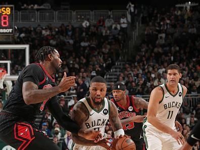 MILWAUKEE, WI - NOVEMBER 13: Damian Lillard #0 of the Milwaukee Bucks drives to the basket during the game against the Chicago Bulls on November 13, 2023 at the Fiserv Forum in Milwaukee, Wisconsin. NOTE TO USER: User expressly acknowledges and agrees that, by downloading and or using this Photograph, user is consenting to the terms and conditions of the Getty Images License Agreement. Mandatory Copyright Notice: Copyright 2023 NBAE (Photo by Gary Dineen/NBAE via Getty Images).