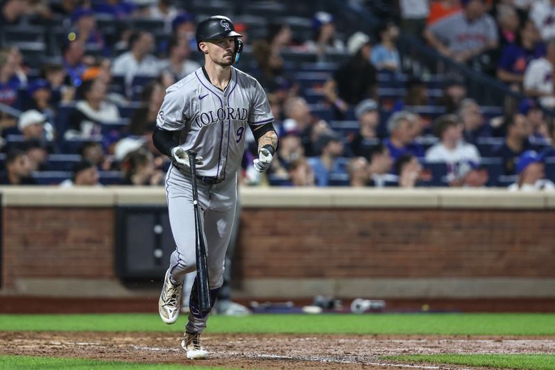 Jul 12, 2024; New York City, New York, USA;  Colorado Rockies center fielder Brenton Doyle (9) hits a two run home run in the eighth inning against the New York Mets at Citi Field. Mandatory Credit: Wendell Cruz-USA TODAY Sports