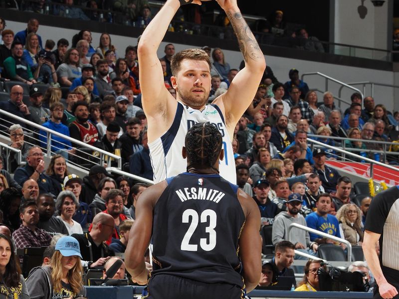 INDIANAPOLIS, IN - MARCH 27: Luka Doncic #77 of the Dallas Mavericks looks to pass the ball during the game against the Indiana Pacers on March 27, 2023 at Gainbridge Fieldhouse in Indianapolis, Indiana. NOTE TO USER: User expressly acknowledges and agrees that, by downloading and or using this Photograph, user is consenting to the terms and conditions of the Getty Images License Agreement. Mandatory Copyright Notice: Copyright 2023 NBAE (Photo by Ron Hoskins/NBAE via Getty Images)