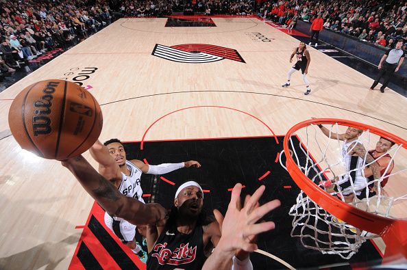 PORTLAND, OR - DECEMBER 29:  Jerami Grant #9 of the Portland Trail Blazers drives to the basket during the game against the San Antonio Spurs on December 29, 2023 at the Moda Center Arena in Portland, Oregon. NOTE TO USER: User expressly acknowledges and agrees that, by downloading and or using this photograph, user is consenting to the terms and conditions of the Getty Images License Agreement. Mandatory Copyright Notice: Copyright 2023 NBAE (Photo by Cameron Browne/NBAE via Getty Images)