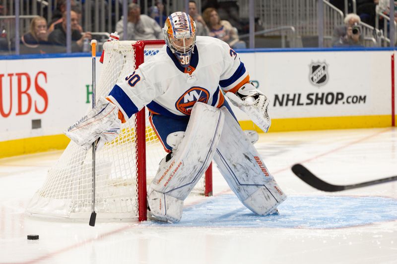 Oct 30, 2023; Elmont, New York, USA; New York Islanders goaltender Ilya Sorokin (30) controls the puck against the Detroit Red Wings during the third period at UBS Arena. Mandatory Credit: Thomas Salus-USA TODAY Sports