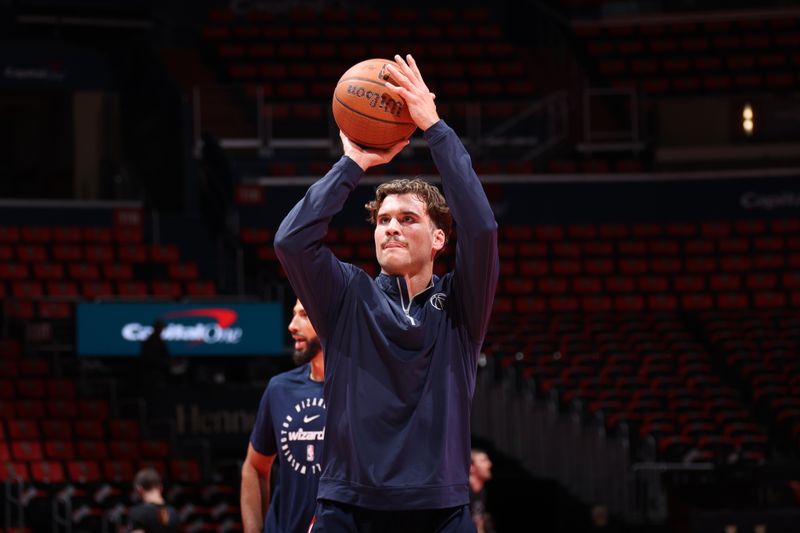 WASHINGTON, DC -? NOVEMBER 22: Corey Kispert #24 of the Washington Wizards warms up before the game against the Boston Celtics during the Emirates NBA Cup game on November 22, 2024 at Capital One Arena in Washington, DC. NOTE TO USER: User expressly acknowledges and agrees that, by downloading and or using this Photograph, user is consenting to the terms and conditions of the Getty Images License Agreement. Mandatory Copyright Notice: Copyright 2024 NBAE (Photo by Stephen Gosling/NBAE via Getty Images)