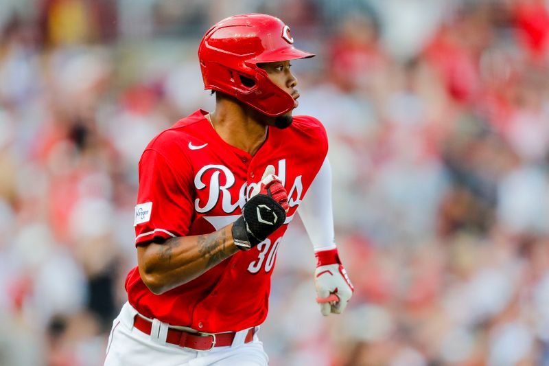 Jun 24, 2023; Cincinnati, Ohio, USA; Cincinnati Reds pinch hitter Will Benson (30) reacts after hitting a solo home run in the ninth inning against the Atlanta Braves at Great American Ball Park. Mandatory Credit: Katie Stratman-USA TODAY Sports