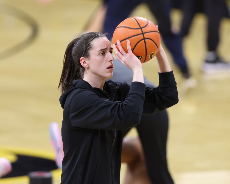 Feb 15, 2024; Iowa City, Iowa, USA; Iowa Hawkeyes guard Caitlin Clark (22) warms up before her game with the Michigan Wolverines at Carver-Hawkeye Arena. Mandatory Credit: Reese Strickland-USA TODAY Sports
