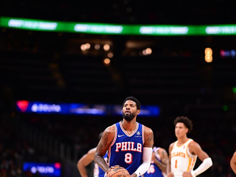 ATLANTA, GA - OCTOBER 14:  Paul George #8 of the Philadelphia 76ers prepares to shoot a free throw during the game against the Atlanta Hawks during a preseason game on October 14, 2024 at State Farm Arena in Atlanta, Georgia.  NOTE TO USER: User expressly acknowledges and agrees that, by downloading and/or using this Photograph, user is consenting to the terms and conditions of the Getty Images License Agreement. Mandatory Copyright Notice: Copyright 2024 NBAE (Photo by Adam Hagy/NBAE via Getty Images)