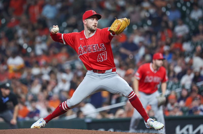 May 21, 2024; Houston, Texas, USA; Los Angeles Angels starting pitcher Griffin Canning (47) delivers a pitch during the second inning against the Houston Astros at Minute Maid Park. Mandatory Credit: Troy Taormina-USA TODAY Sports