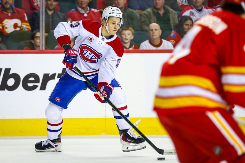 Oct 22, 2025; Calgary, Alberta, CAN; Montreal Canadiens right wing Ivan Demidov (93) controls the puck against the Calgary Flames during the first period at Scotiabank Saddledome. Mandatory Credit: Sergei Belski-Imagn Images