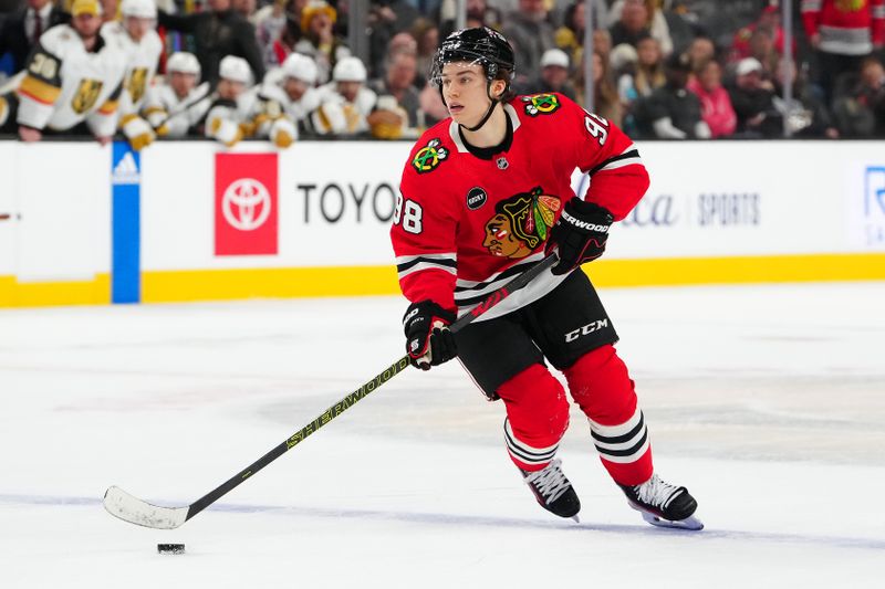 Oct 27, 2023; Las Vegas, Nevada, USA; Chicago Blackhawks center Connor Bedard (98) skates against the Vegas Golden Knights during an overtime period at T-Mobile Arena. Mandatory Credit: Stephen R. Sylvanie-USA TODAY Sports