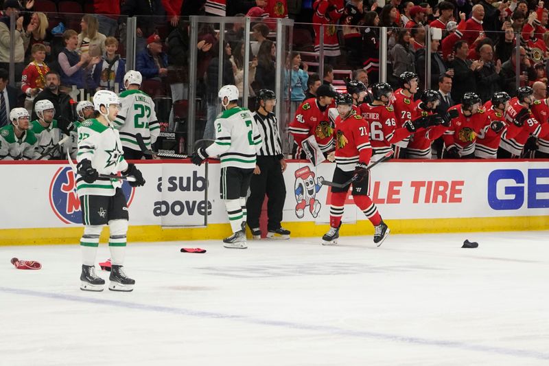 Nov 27, 2024; Chicago, Illinois, USA; Chicago Blackhawks left wing Taylor Hall (71) celebrates his hat trick against the Dallas Stars during the second period at United Center. Mandatory Credit: David Banks-Imagn Images