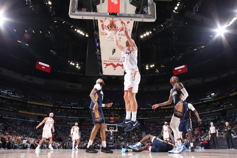 NEW ORLEANS, LA - DECEMBER 5: Mason Plumlee #22 of the Phoenix Suns dunks the ball during the game against the New Orleans Pelicans on December 5, 2024 at the Smoothie King Center in New Orleans, Louisiana. NOTE TO USER: User expressly acknowledges and agrees that, by downloading and or using this Photograph, user is consenting to the terms and conditions of the Getty Images License Agreement. Mandatory Copyright Notice: Copyright 2024 NBAE (Photo by Layne Murdoch Jr./NBAE via Getty Images)