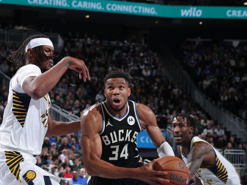 MILWAUKEE, WI - NOVEMBER 22: Giannis Antetokounmpo #34 of the Milwaukee Bucks drives to the basket during the game against the Indiana Pacers  during a Emirates NBA Cup on November 22, 2024 at Fiserv Forum Center in Milwaukee, Wisconsin. NOTE TO USER: User expressly acknowledges and agrees that, by downloading and or using this Photograph, user is consenting to the terms and conditions of the Getty Images License Agreement. Mandatory Copyright Notice: Copyright 2024 NBAE (Photo by Gary Dineen/NBAE via Getty Images).