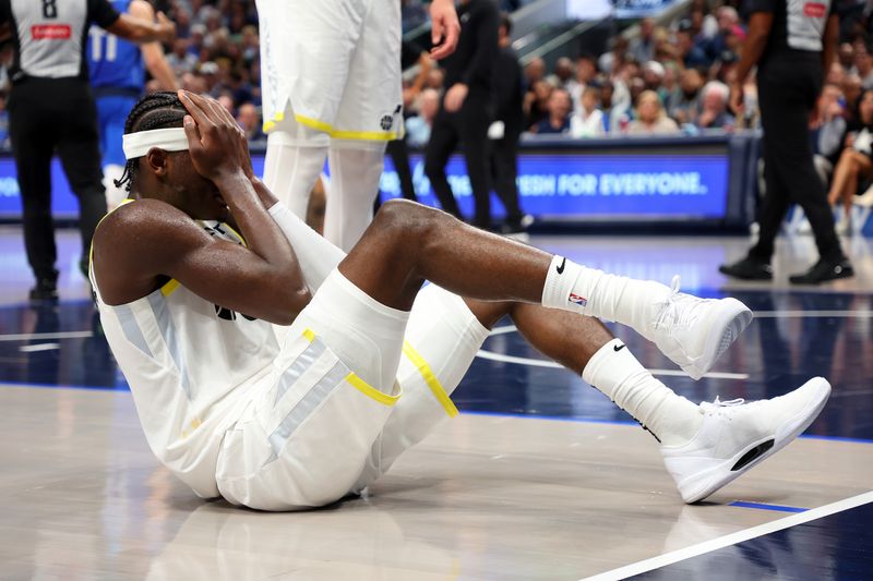 DALLAS, TEXAS - OCTOBER 28: Taylor Hendricks #0 of the Utah Jazz reacts after being injured in the third quarter of a game against the Dallas Mavericks at American Airlines Center on October 28, 2024 in Dallas, Texas. NOTE TO USER: User expressly acknowledges and agrees that, by downloading and or using this photograph, User is consenting to the terms and conditions of the Getty Images License Agreement. (Photo by Richard Rodriguez/Getty Images)