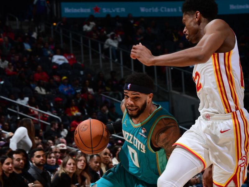 ATLANTA, GA - MARCH 23: Miles Bridges #0 of the Charlotte Hornets dribbles the ball during the game against the Atlanta Hawks on March 23, 2024 at State Farm Arena in Atlanta, Georgia.  NOTE TO USER: User expressly acknowledges and agrees that, by downloading and/or using this Photograph, user is consenting to the terms and conditions of the Getty Images License Agreement. Mandatory Copyright Notice: Copyright 2024 NBAE (Photo by Scott Cunningham/NBAE via Getty Images)