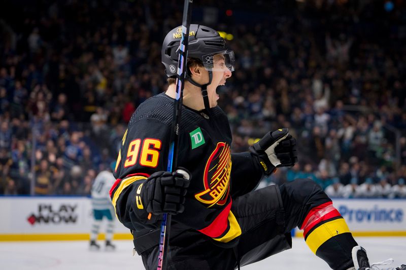 Dec 23, 2023; Vancouver, British Columbia, CAN; Vancouver Canucks forward Andrei Kuzmenko (96) celebrates his first goal of the game against the San Jose Sharks in the first period at Rogers Arena. Mandatory Credit: Bob Frid-USA TODAY Sports