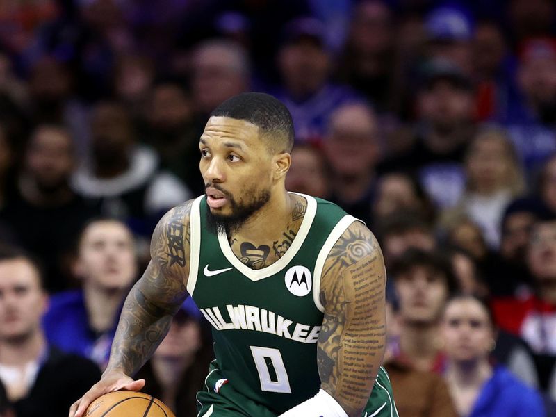 PHILADELPHIA, PENNSYLVANIA - FEBRUARY 25: Damian Lillard #0 of the Milwaukee Bucks dribbles against the Philadelphia 76ers at the Wells Fargo Center on February 25, 2024 in Philadelphia, Pennsylvania. (Photo by Tim Nwachukwu/Getty Images)