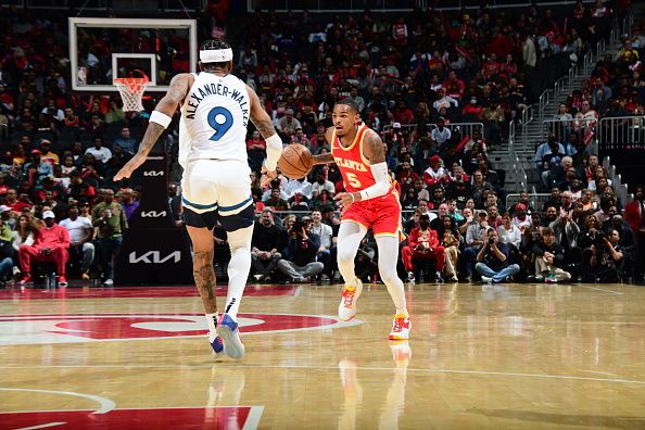 ATLANTA, GA - OCTOBER 30: Dejounte Murray #5 of the Atlanta Hawks brings the ball up court against the Minnesota Timberwolves on October 30, 2023 at State Farm Arena in Atlanta, Georgia.  NOTE TO USER: User expressly acknowledges and agrees that, by downloading and/or using this Photograph, user is consenting to the terms and conditions of the Getty Images License Agreement. Mandatory Copyright Notice: Copyright 2023 NBAE (Photo by Scott Cunningham/NBAE via Getty Images)