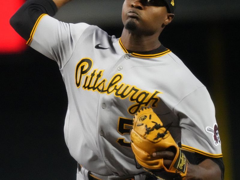 Jul 9, 2023; Phoenix, Arizona, USA; Pittsburgh Pirates Yerry De Los Santos (57) pitches against the Arizona Diamondbacks at Chase Field. Mandatory Credit: Joe Rondone-USA TODAY Sports