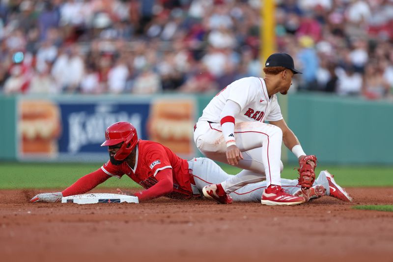 Jun 3, 2025; Boston, Massachusetts, USA; Los Angeles Angels center fielder Jo Adell (7) steals second during the third inning against the Boston Red Sox at Fenway Park. Mandatory Credit: Paul Rutherford-Imagn Images
