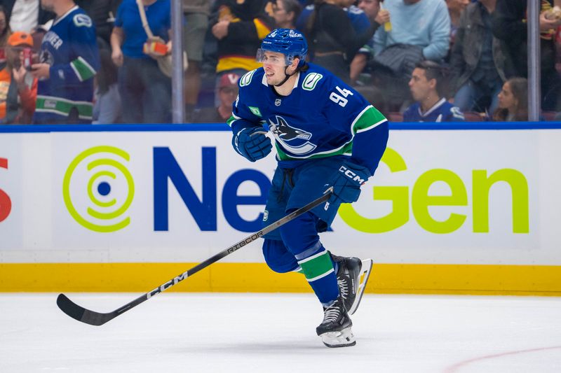 Sep 24, 2024; Vancouver, British Columbia, CAN; Vancouver Canucks forward Linus Karlsson (94) skates against the Seattle Kraken during the first period at Rogers Arena. Mandatory Credit: Bob Frid-Imagn Images