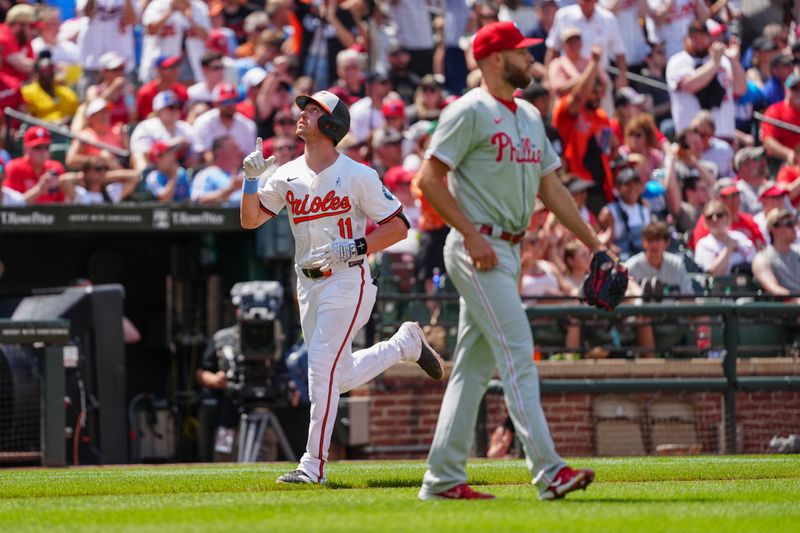 Jun 16, 2024; Baltimore, Maryland, USA; Baltimore Orioles second baseman Jordan Westburg (11) reacts to hitting a three run home run as he rounds the bases against the Philadelphia Phillies during the fifth inning at Oriole Park at Camden Yards. Mandatory Credit: Gregory Fisher-USA TODAY Sports