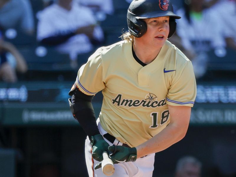 Jul 8, 2023; Seattle, Washington, USA; American League Futures right fielder Heston Kjerstad (18) of the Baltimore Orioles hits a single against the National League Futures during the third inning of the All Star-Futures Game at T-Mobile Park. Mandatory Credit: Joe Nicholson-USA TODAY Sports