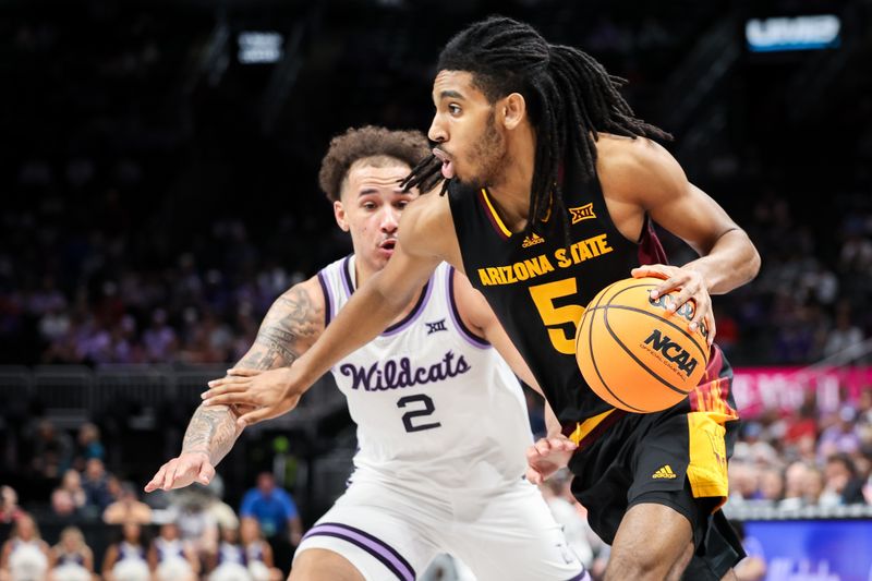 Mar 11, 2025; Kansas City, MO, USA; Arizona State Sun Devils guard Amier Ali (5) drives to the basket around Kansas State Wildcats guard Max Jones (2) during the second half at T-Mobile Center. Mandatory Credit: William Purnell-Imagn Images