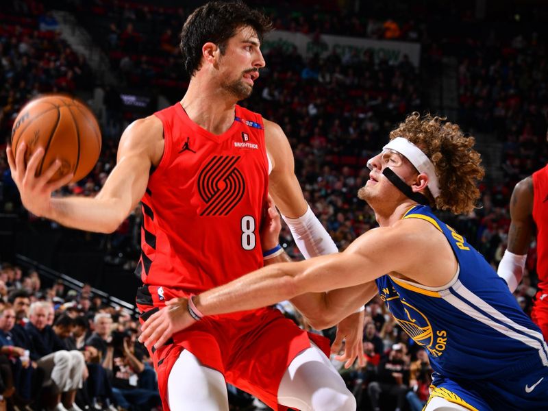 PORTLAND, OR - OCTOBER 23: Deni Avdija #8 of the Portland Trail Blazers handles the ball during the game against the Golden State Warriors on October 23, 2024 at the Moda Center Arena in Portland, Oregon. NOTE TO USER: User expressly acknowledges and agrees that, by downloading and or using this photograph, user is consenting to the terms and conditions of the Getty Images License Agreement. Mandatory Copyright Notice: Copyright 2024 NBAE (Photo by Barry Gossage/NBAE via Getty Images)