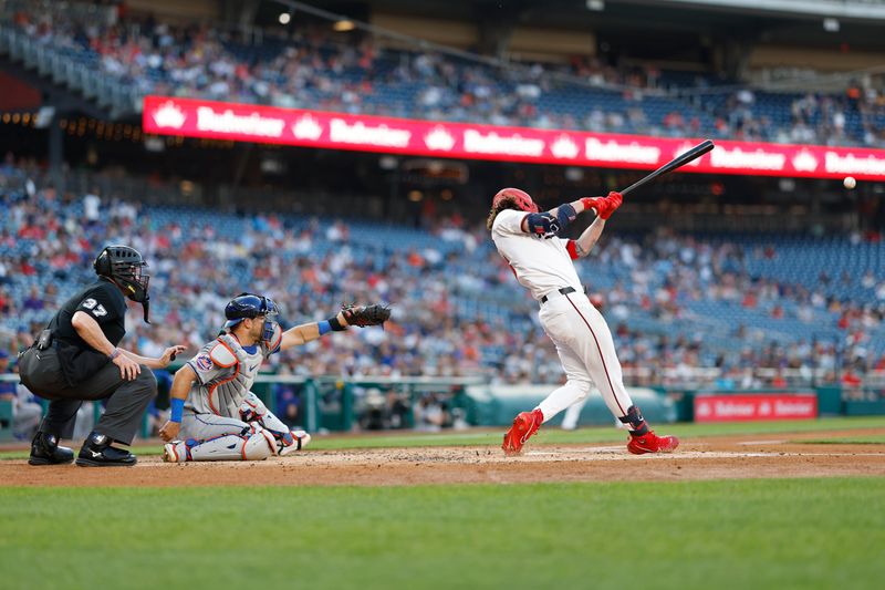Jun 3, 2024; Washington, District of Columbia, USA; Washington Nationals outfielder Jesse Winker (6) hits an RBI single against the New York Mets during the second inning at Nationals Park. Mandatory Credit: Geoff Burke-USA TODAY Sports