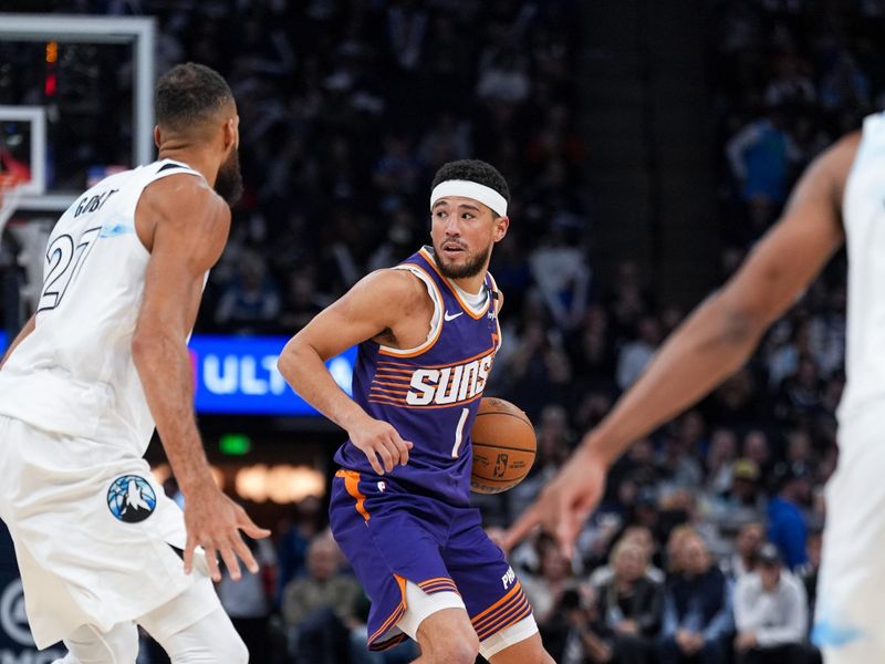 MINNEAPOLIS, MN -  NOVEMBER 17: Devin Booker #1 of the Phoenix Suns handles the ball during the game against the Minnesota Timberwolves on November 17, 2024 at Target Center in Minneapolis, Minnesota. NOTE TO USER: User expressly acknowledges and agrees that, by downloading and or using this Photograph, user is consenting to the terms and conditions of the Getty Images License Agreement. Mandatory Copyright Notice: Copyright 2024 NBAE (Photo by Jordan Johnson/NBAE via Getty Images)