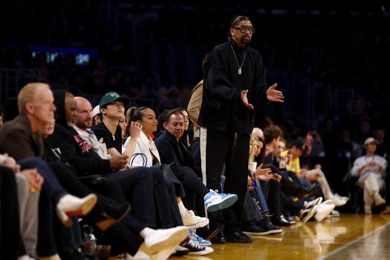 LOS ANGELES, CALIFORNIA - FEBRUARY 13: Jalen Rose cheers for the Detroit Pistons during the game against the Los Angeles Lakers at Crypto.com Arena on February 13, 2024 in Los Angeles, California. NOTE TO USER: User expressly acknowledges and agrees that, by downloading and or using this photograph, user is consenting to the terms and conditions of the Getty Images License Agreement.  (Photo by Katelyn Mulcahy/Getty Images)