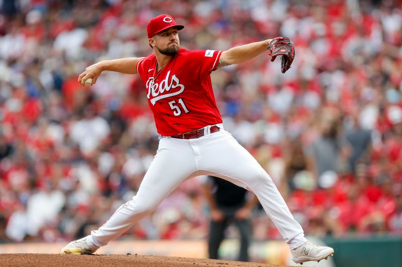 Jun 24, 2023; Cincinnati, Ohio, USA; Cincinnati Reds starting pitcher Graham Ashcraft (51) pitches against the Atlanta Braves in the first inning at Great American Ball Park. Mandatory Credit: Katie Stratman-USA TODAY Sports